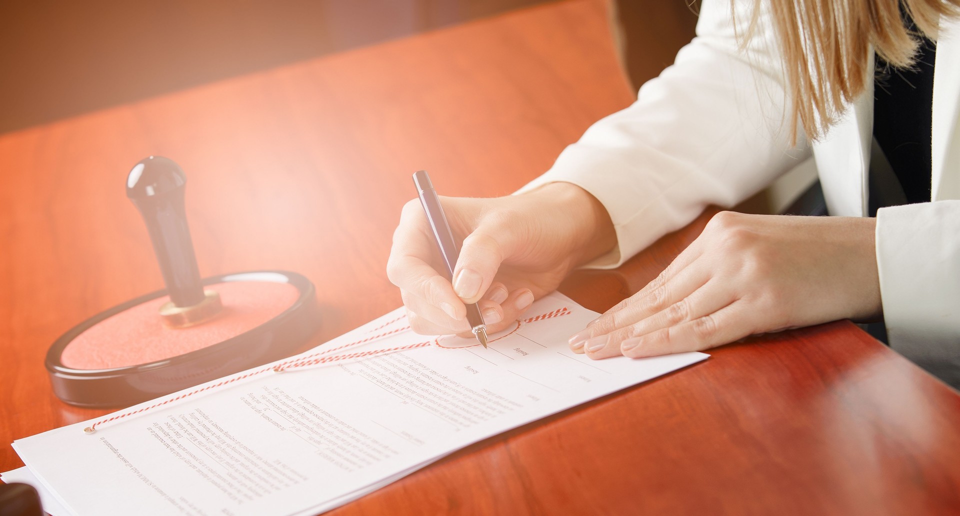 Woman Notary Public signing the contract